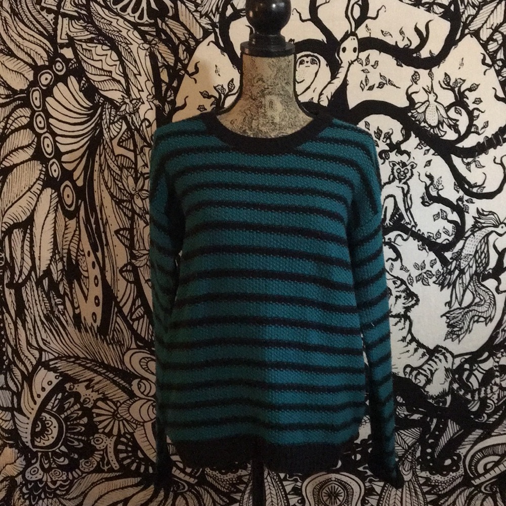 Green and black striped sweater